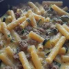 Piatto di Caserecce con salsiccia, zucchine e Philadelphia, cremosità e sapori.