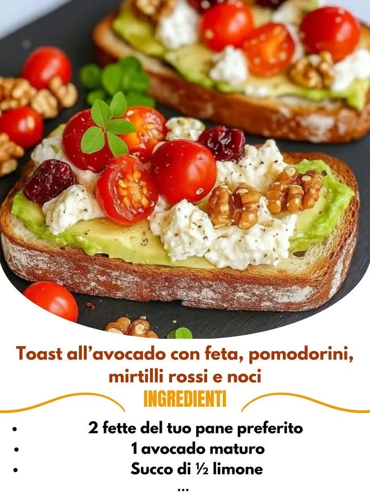 Toast all’avocado con feta, pomodorini, mirtilli rossi e noci.