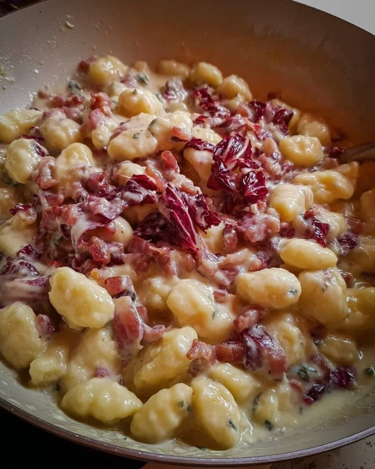 Chicche di patate con gorgonzola, fontina, speck e radicchio