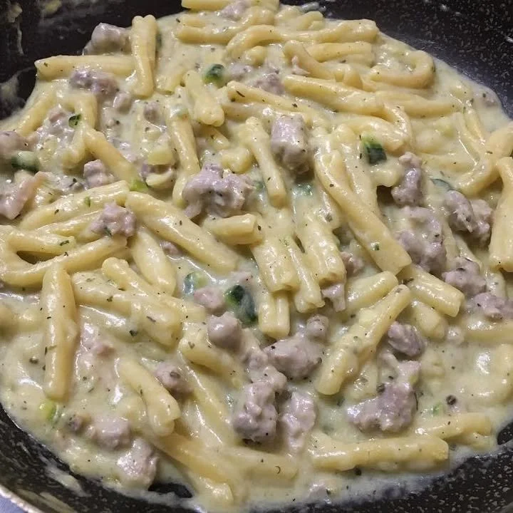 Caserecce with sausage, zucchini, and Philadelphia.