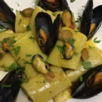 Paccheri con Porcini e Cozze, piatto cremoso e gustoso