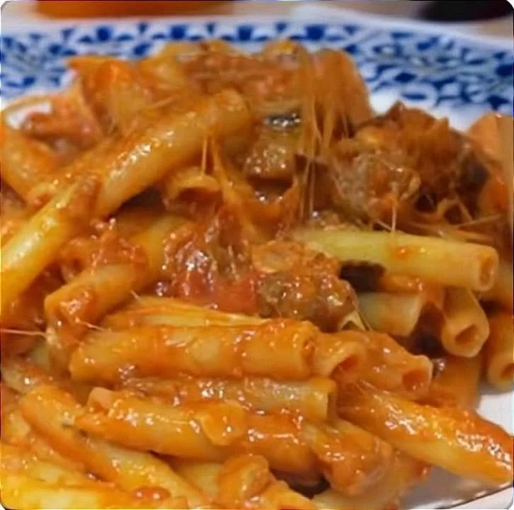Pasta with fried eggplant and smoked provola