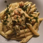 Penne rigate con zucchine, gamberetti e philadelphia salmonata