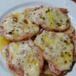 Scaloppine alla Valdostana servite con contorni deliziosi