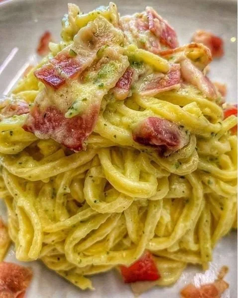 Tagliolini with zucchini cream, bacon, and Philadelphia